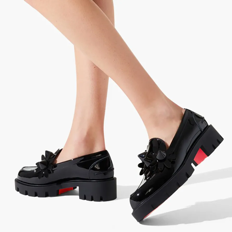Daisy spikes black patent flats